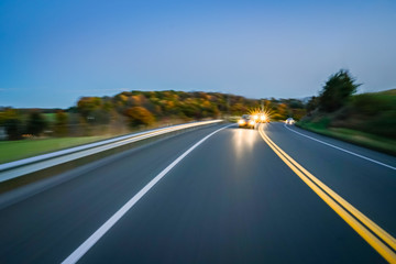 Naklejka premium Evening night headlights road blur concept