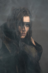 Cyberpunk female portrait with painted eye mask