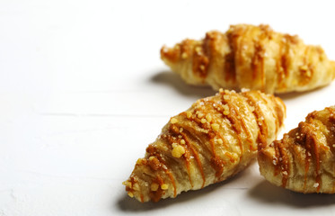 Salted caramel croissants. Topped with a caramel drizzle and a sweet and salty crumble.