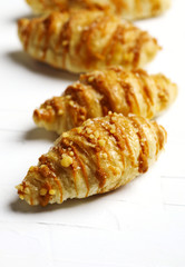 Salted caramel croissants. Topped with a caramel drizzle and a sweet and salty crumble.