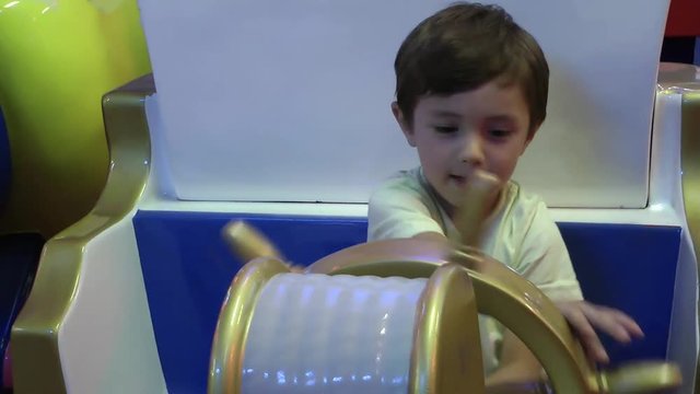 Child playing with helm