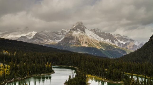 Time lapse Mount Cathedral with sun, clouds, and rain in Yoho National Park, BC, Canada