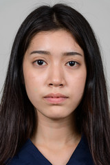 Fototapeta premium Portrait of beautiful young Asian Thai woman
