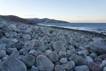 Landscape of round shape rocks beach in Terriberka