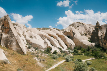 Beautiful view of the hills of Cappadocia. One of the sights of Turkey. Tourism, travel, beautiful landscapes, nature.