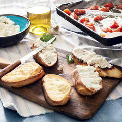 Bruschetta with Baked tomato and garlic close up