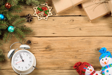 Christmas background with fir tree and decoration on wooden table