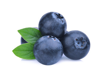 stack of blueberries with green leaves isolated on white background