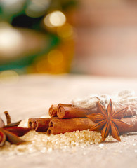 Close-up still-life of cinnamon and star anise on wooden boards background