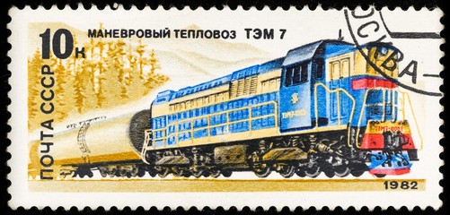 Samara, Russia - November 25, 2017: Old postage stamp shows soviet retro locomotive, locomotive...