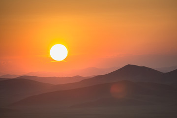 Mountains and prairies under the sun