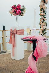 Wedding decoration with flowers and champaign glasses.