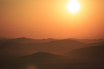 Mountains and prairies under the sun