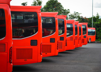 Red buses parking at station