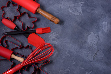 Red cookies cutters and kitchen utensols