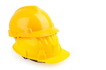 Yellow safety helmet or hard hat isolated on white background
