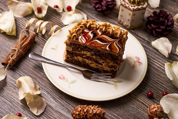 Slice of peanut cake with chocolate