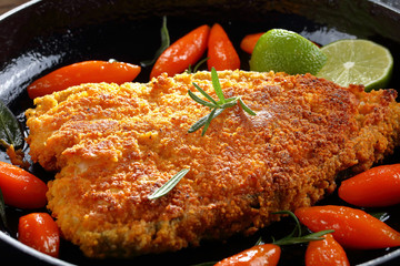 tasty fried breaded white fish steak