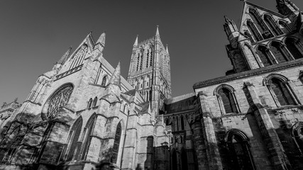 Looking Up South Transept and Tower of Lincoln Cathedral, Bishop Eye Tracery, Black and White Horizontal Photography
