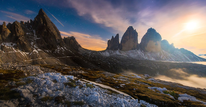 Alps Mountain landscape with night sky and Mliky way, Tre Cime di Lavaredo, Dolomites