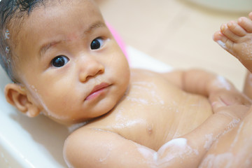 8 months old Asian baby take a shower