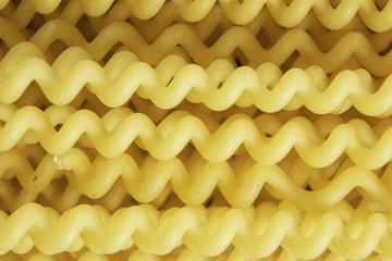 Uncooked spaghetti on table