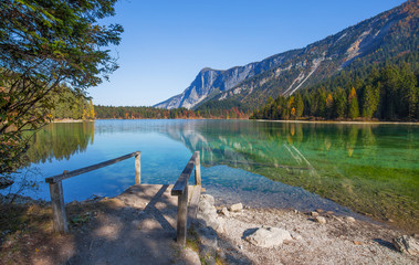 Autumnal view of Tovel lake, Val di Non within the Adamello-Brenta Natural Park, Trentino...