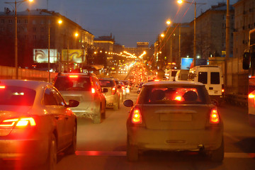 Fototapeta na wymiar city traffic in evening rush hour