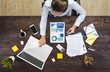 Businesswoman Working At Notebook