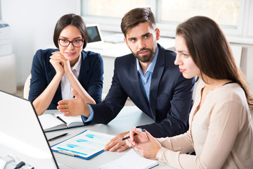 Group of business people at a meeting