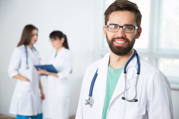 Portrait of a young doctor in a clinic