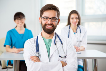 Fototapeta premium Portrait of a young doctor in a clinic
