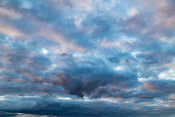 Obraz premium clouds in the sky at sunset as background