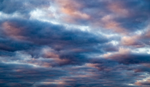 clouds in the sky at sunset as background