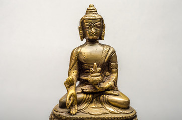 Obraz premium Bronze buddha isolated on white background