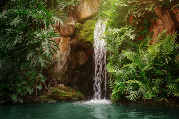 Artificial tropical garden waterfall