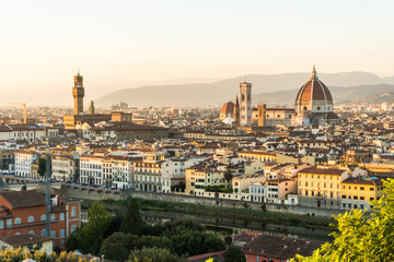Fototapeta na wymiar Florence, ITALY - October, 2017: Beautiful cityscape skyline of Firenze, Italy, with the bridges over the river Arno