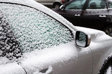 the side of the car in the snow