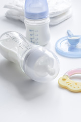 preparation of mixture baby feeding on white background