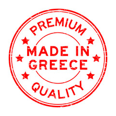 Grunge red premium quality made in Greece round rubber seal stamp on white background