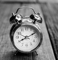 Restro alarm clock on old wood tabel