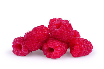 ripe raspberries isolated on white background close up © vadarshop