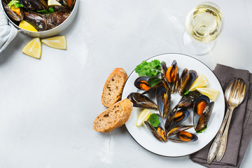 Shellfish mussels with white wine, seafood on a table