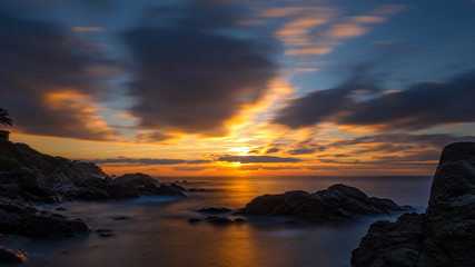 Fototapeta premium Beautiful sunrise in a bay in Costa Brava, Spain