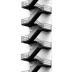 Metal fire escape on facade of old building