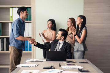 business people clapping in office after signing agreement, Achievement, congratulation and appreciation concept - 182702487