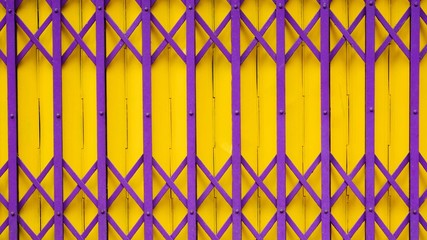 purple and yellow antique slide steel door