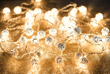 Christmas Gold background with garland lights