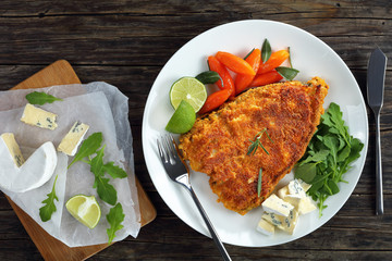white fish steak served on white plate