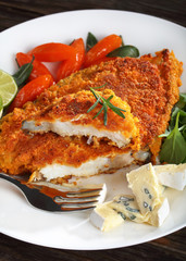 fried fish steak on white plate